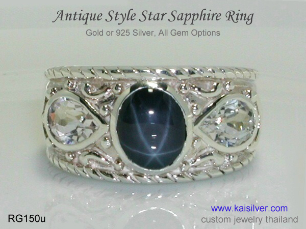 gold or silver gemstone ring with 3 gems